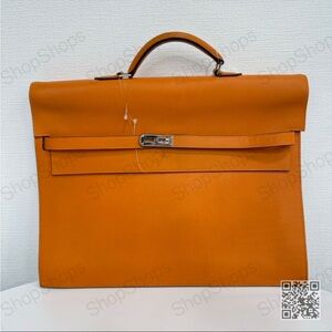 Hermes Orange Satchel with Classic Design